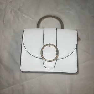 white hand bag with cross body strap